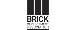 three black bricks positioned vertically above the words Brick Development Association