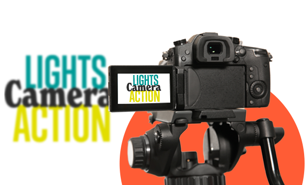 Image of a video camera with the words 'lights, camera, action' on the camera screen